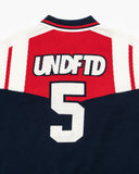 UNDEFEATED SP26 SOCCER KNIT POLO SHIRTS - NAVY