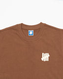 UNDEFEATED SP26 ICON SLEEVELESS TEE - BROWN