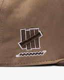 UNDEFEATED X SNEAKERLAH - PLAY DIRTY CAP - BROWN