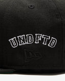 UNDEFEATED HO25 X NEW ERA ALL OVER FITTED - BLACK