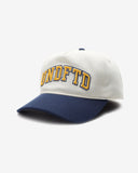 UNDEFEATED 2 TONE ARCH SNAPBACK IVORY NAVY