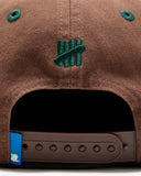 FA26 UNDEFEATED GRADIENT SNAPBACK - BROWN