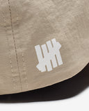 UNDEFEATED STENCIL STRAPBACK LIGHT KHAKI