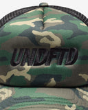 UNDEFEATED SURPLUS TRUCKER WOODLAND CAMO