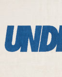 UNDEFEATED SU26 LOGO BEACH TOWEL- CREAM