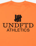 UNDEFEATED SP26 ATHLETICS S/S TEE-ORANGE