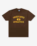 UNDEFEATED HO25 MISPRINT S/S TEE - BROWN