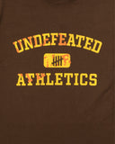 UNDEFEATED HO25 MISPRINT S/S TEE - BROWN