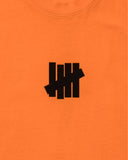 UNDEFEATED SCREW U S/S TEE - ORANGE