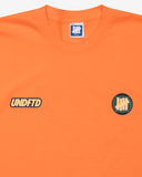 UNDEFEATED SP26 SERIES S/S TEE-ORANGE
