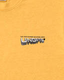 UNDEFEATED TEAM STORE S/S TEE MARIGOLD