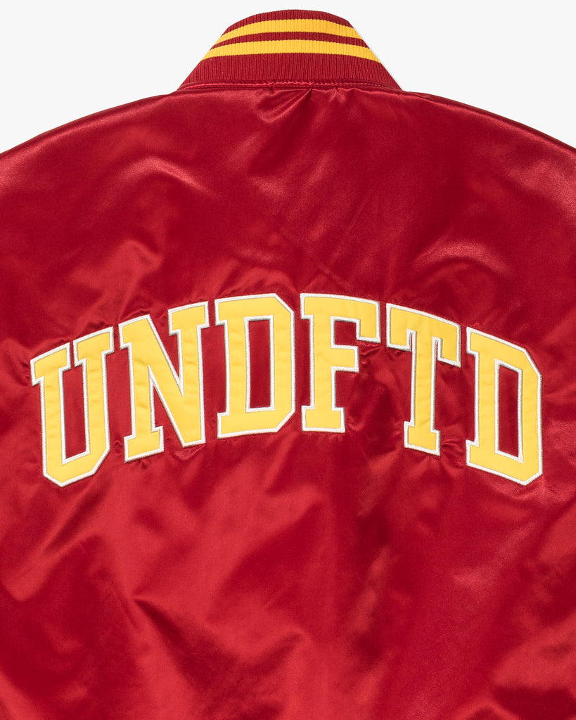 UNDEFEATED ICON SATIN VARSITY JACKET - SCARLET