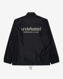 UNDEFEATED SP26 INC. COACHES JACKET - BLACK