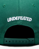 FA26 UNDEFEATED X NE STRIPE SNAPBACK - HUNTER GREEN