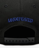 FA26 UNDEFEATED X NE STRIPE SNAPBACK - BLACK