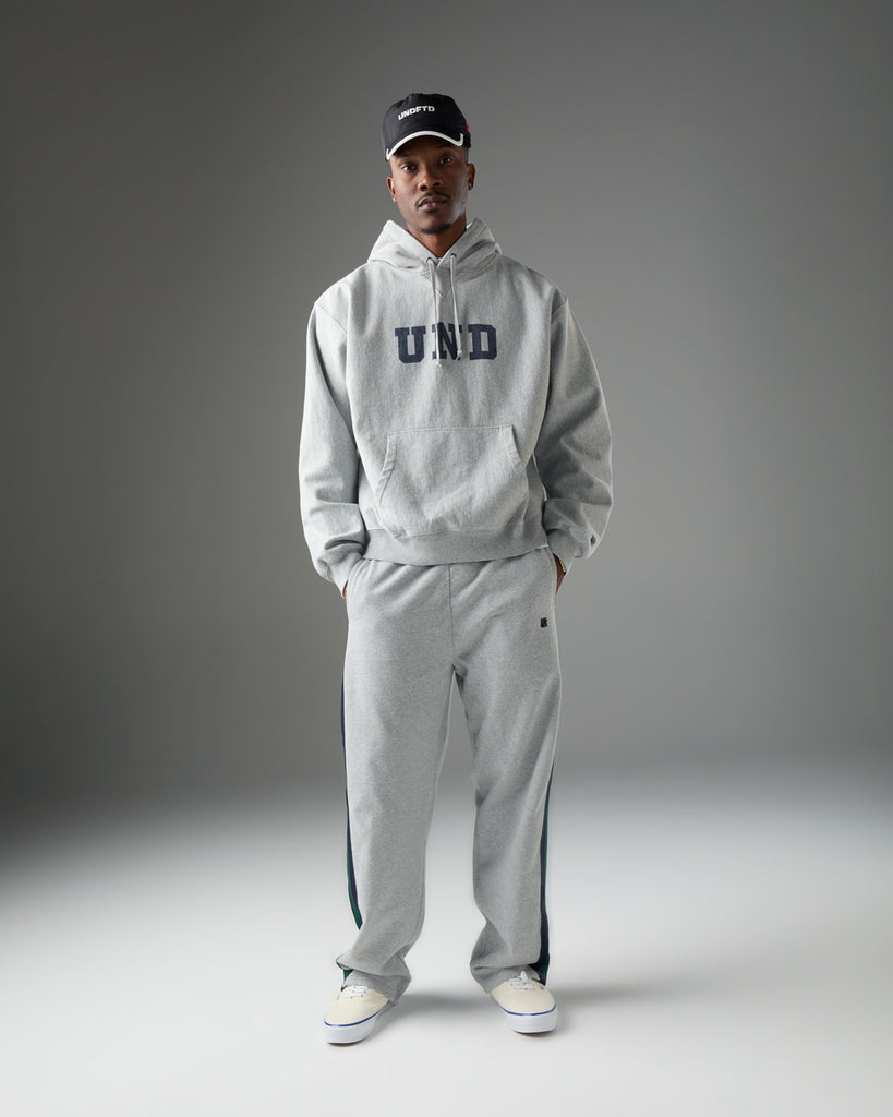 UNDEFEATED SP26 BLOCK LOGO PULLOVER HOOD - HEATHER GREY