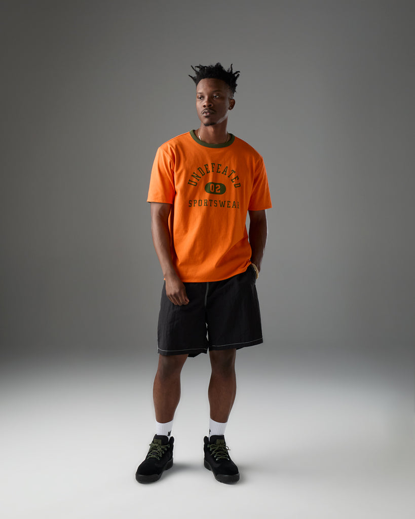 UNDEFEATED SP26 REVERSIBLE GYM S/S TEE - OLIVE