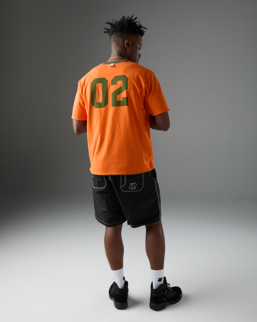 UNDEFEATED SP26 REVERSIBLE GYM S/S TEE - BLACK