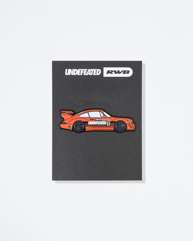 UNDEFEATED SP26 X RWB PIN-ORANGE