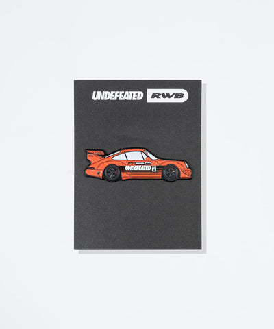UNDEFEATED SP26 X RWB PIN-ORANGE