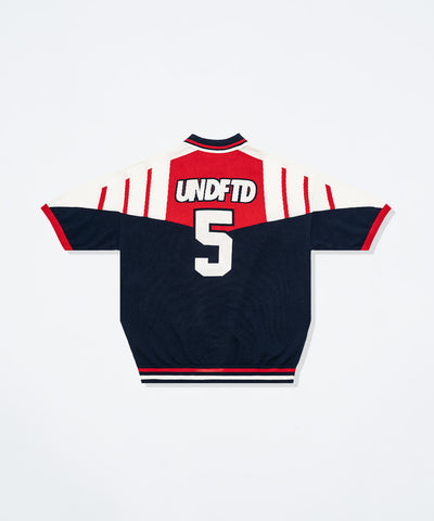 UNDEFEATED SP26 SOCCER KNIT POLO SHIRTS - NAVY