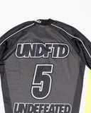 UNDEFEATED SP26 MOTO MESH JERSEY - BLACK