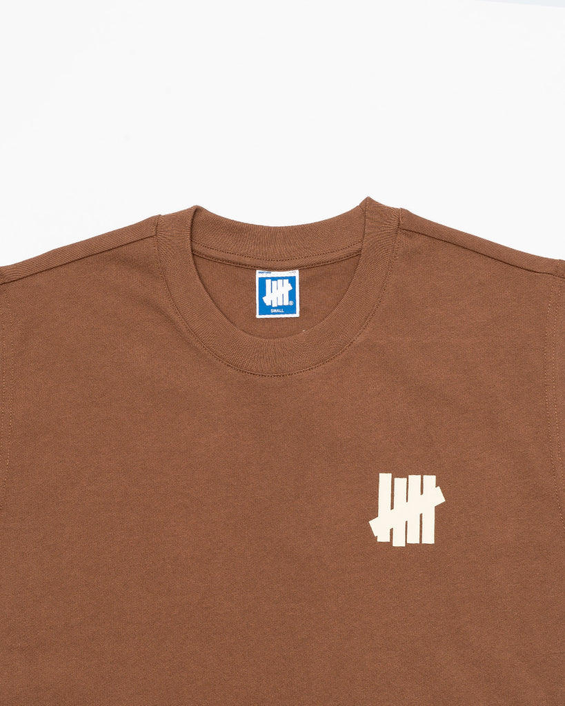 UNDEFEATED SP26 ICON SLEEVELESS TEE - BROWN