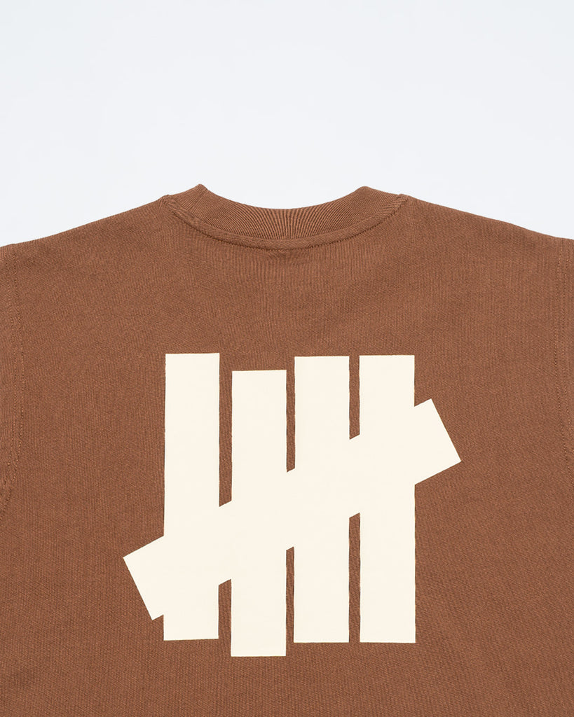 UNDEFEATED SP26 ICON SLEEVELESS TEE - BROWN