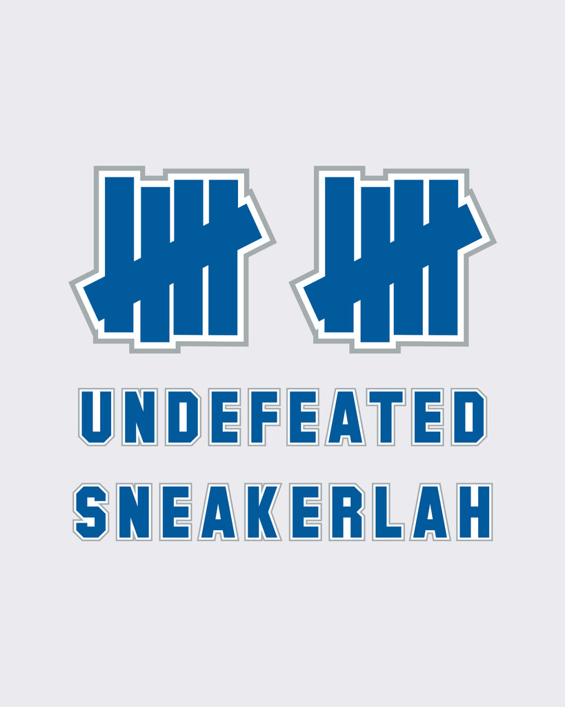UNDEFEATED X SNEAKERLAH - 10YRS STRONG TEE - WHITE
