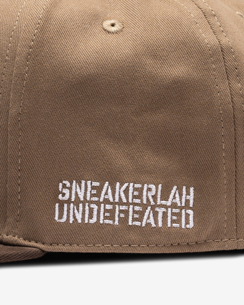 UNDEFEATED X SNEAKERLAH - PLAY DIRTY CAP - BROWN