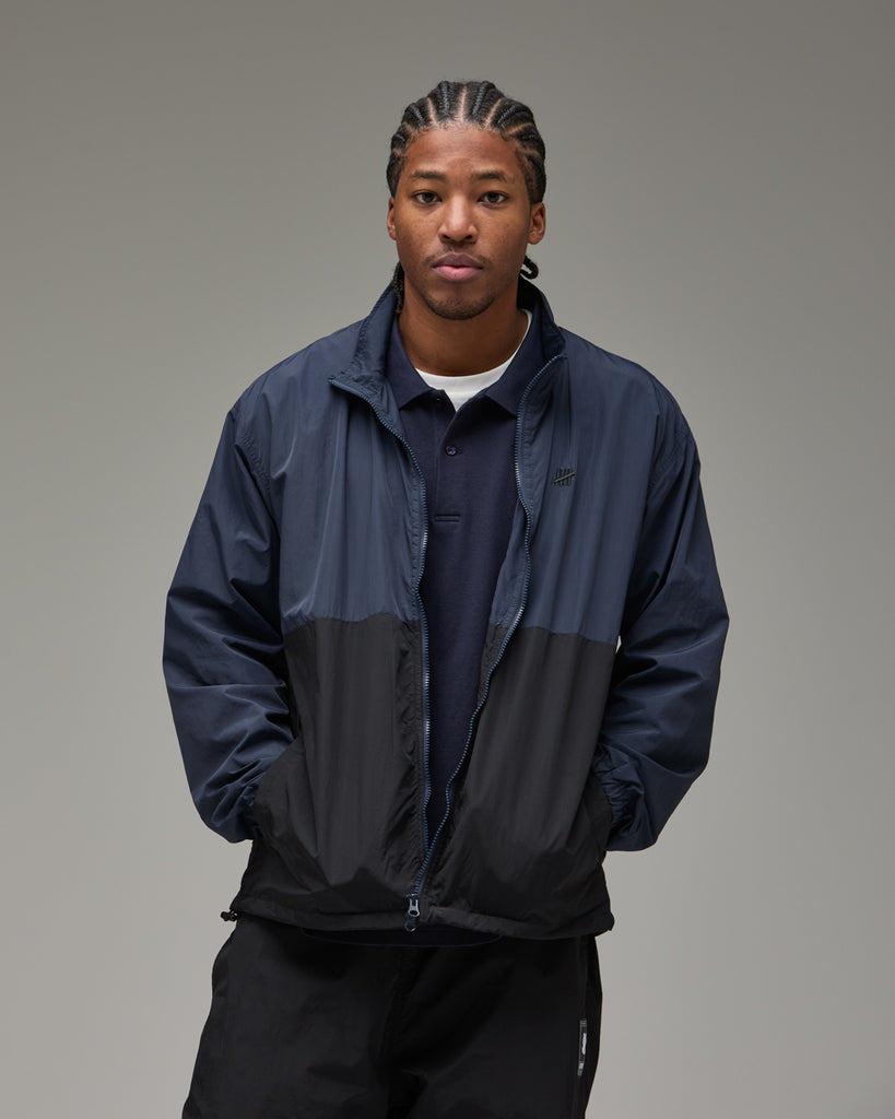 UNDEFEATED 2-TONE TRACK JACKET NAVY-BLACK