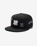 UNDEFEATED HO25 X NEW ERA ALL OVER FITTED - BLACK