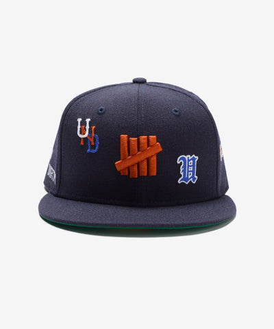UNDEFEATED HO25 X NE ALL OVER FITTED - NAVY