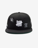 UNDEFEATED HO25 X NEW ERA ALL OVER FITTED - BLACK