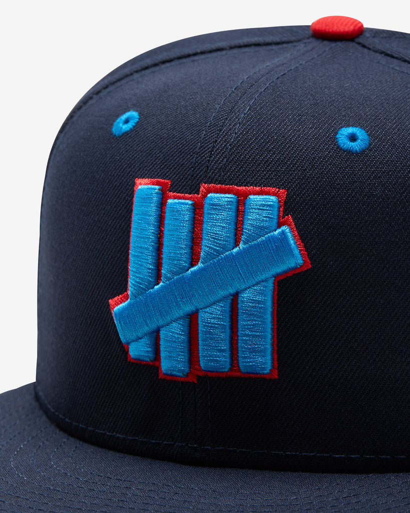 FA26 UNDEFEATED X NE ICON HAPPY FITTED - NAVY