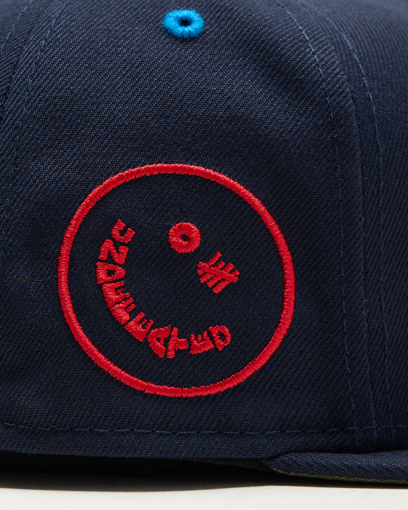 FA26 UNDEFEATED X NE ICON HAPPY FITTED - NAVY