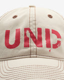UNDEFEATED FA25 DISTRESSED STRAPBACK - SAND