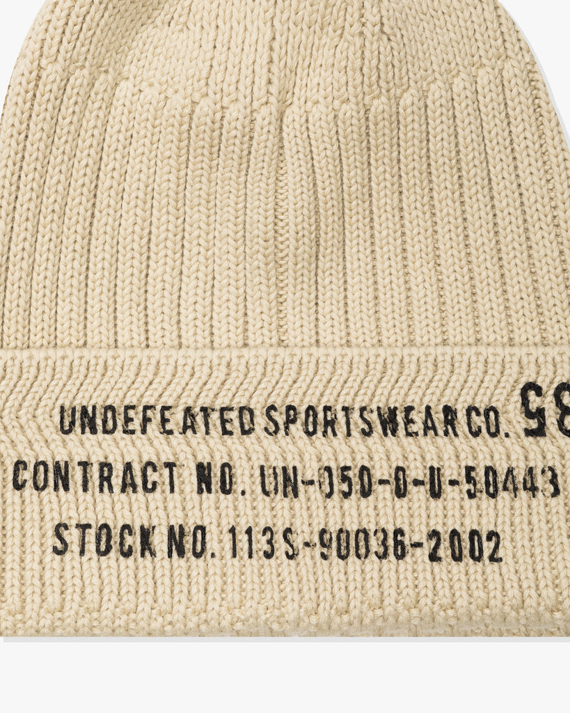 FA26 UNDEFEATED MILITARY CUFF BEANIE - CREAM