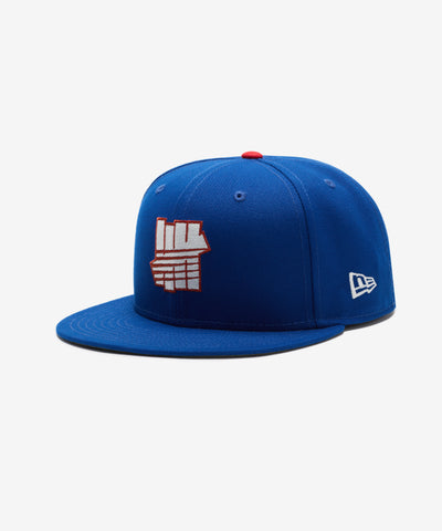 UNDEFEATED SU26 X NE ICON CREST FITTED - BLUE