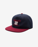 UNDEFEATED SP26 PLAY DIRTY SNAPBACK - NAVY