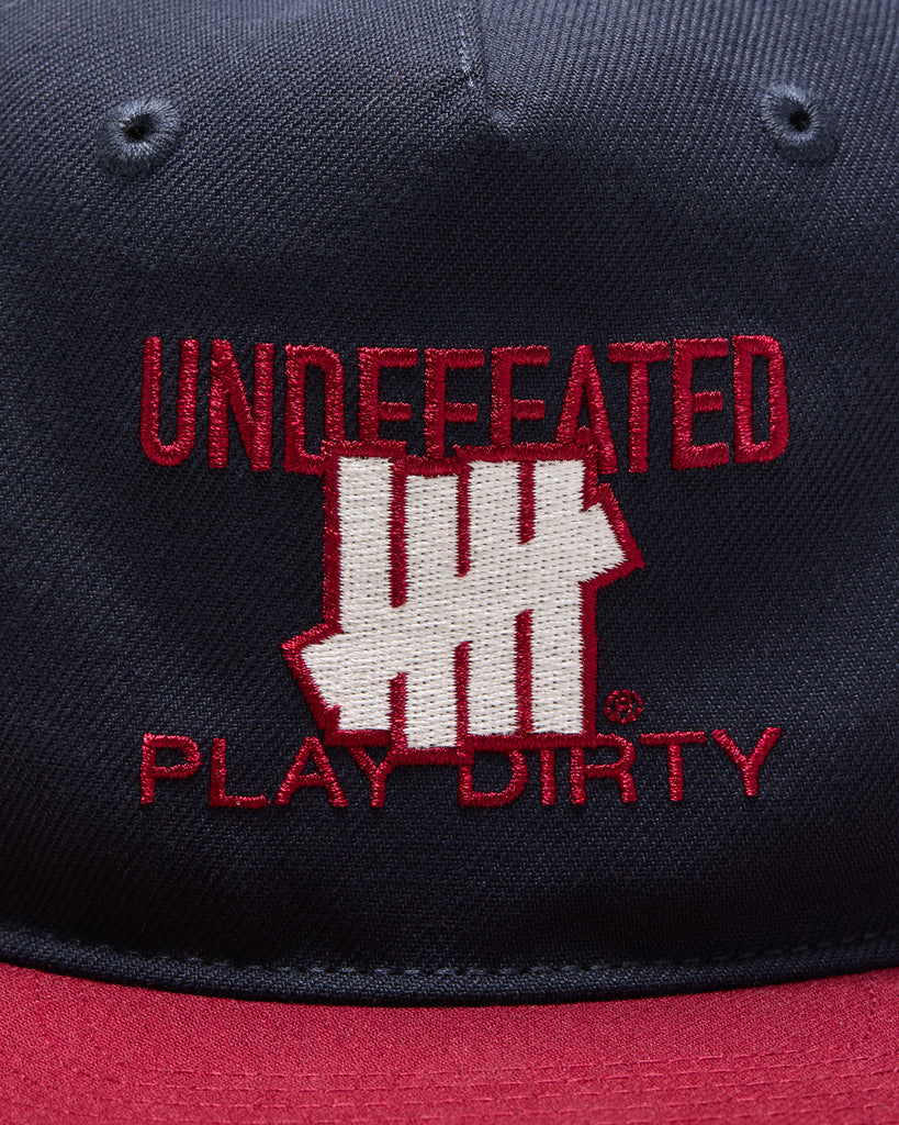 UNDEFEATED SP26 PLAY DIRTY SNAPBACK - NAVY