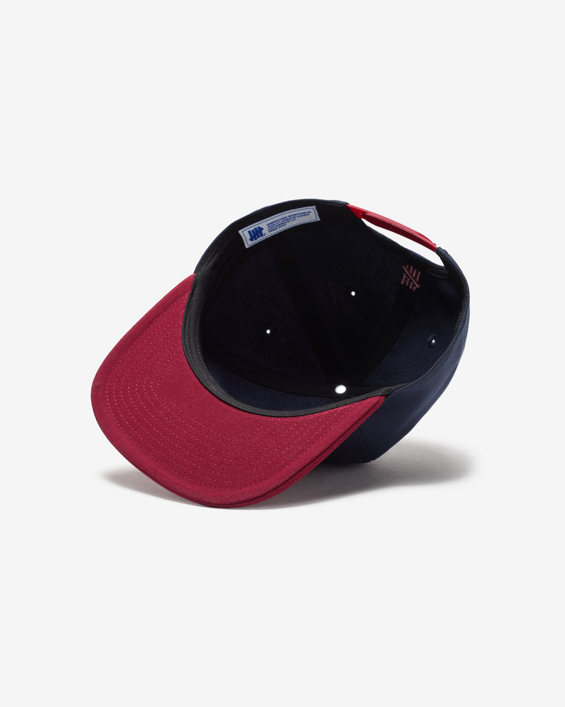 UNDEFEATED SP26 PLAY DIRTY SNAPBACK - NAVY