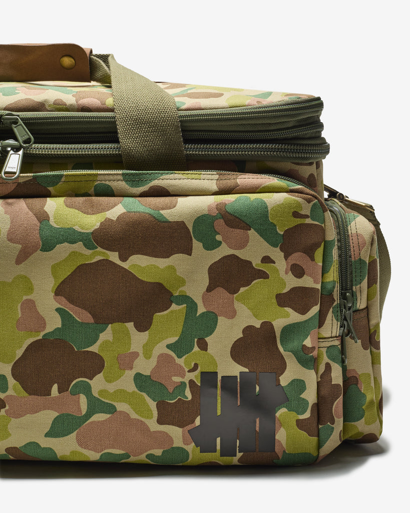 UNDEFEATED FA25 DUCK CAMO DUFFLE - WOODLAND-CAMO