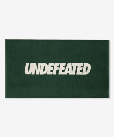UNDEFEATED SU26 LOGO BEACH TOWEL- DARK GREEN