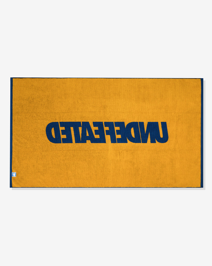 UNDEFEATED SU26 LOGO BEACH TOWEL- ROYAL BLUE
