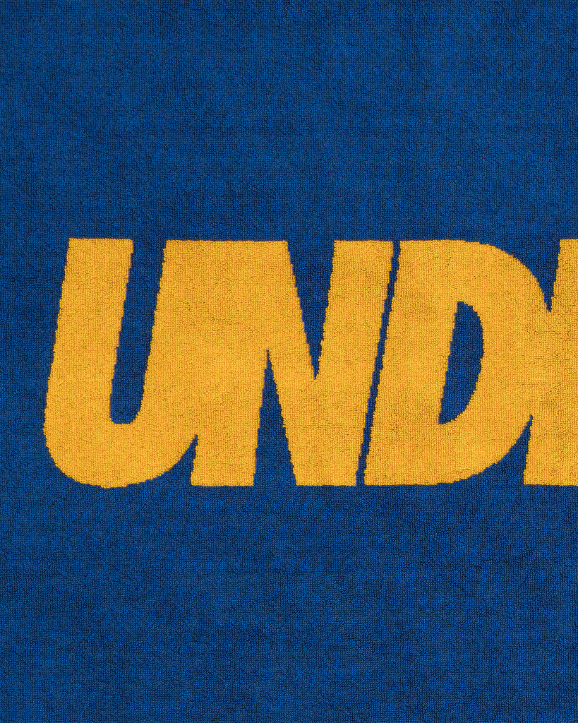 UNDEFEATED SU26 LOGO BEACH TOWEL- ROYAL BLUE