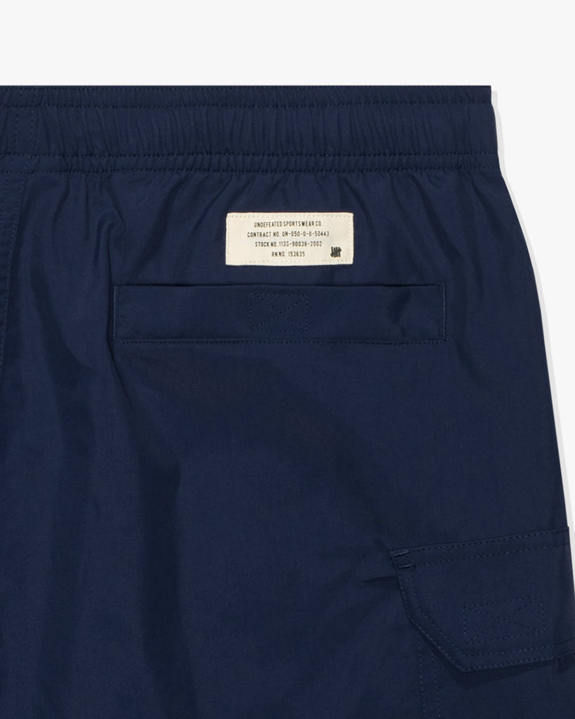 UNDEFEATED SP26 NYLON CARGO SHORT - NAVY