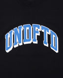 UNDEFEATED SP26 ARC S/S TEE-BLACK