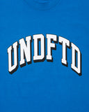 UNDEFEATED SP26 ARC S/S TEE-BLUE