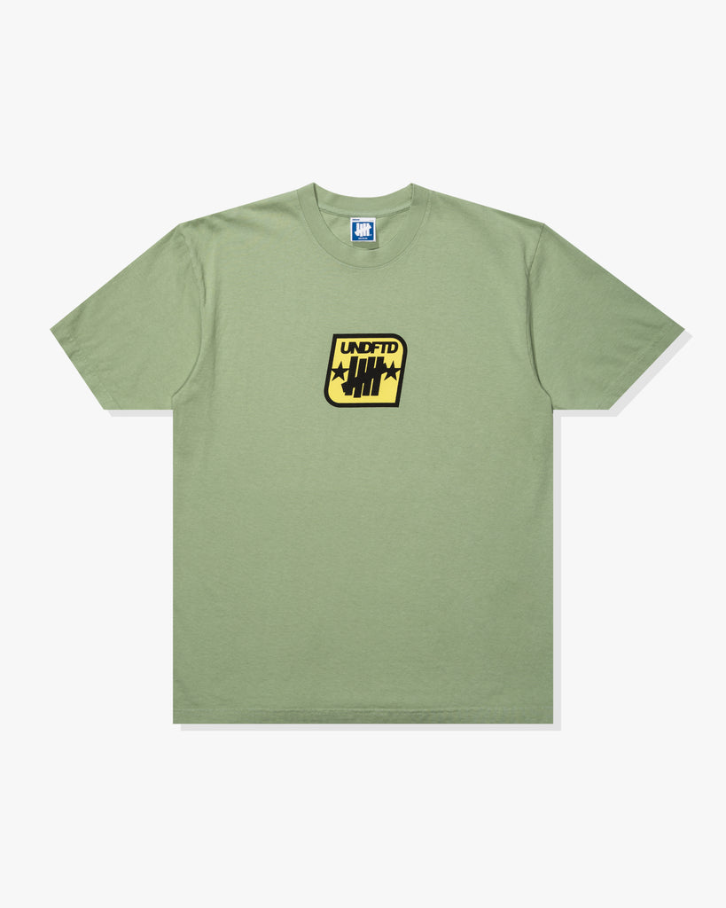 SU26 UNDEFEATED BADGE S/S TEE - SAGE